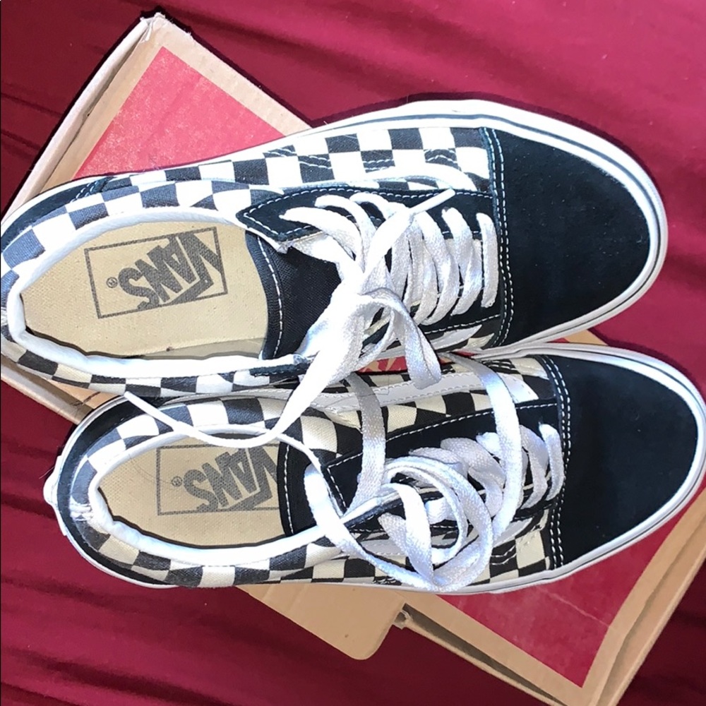 Black and white vans . Lightly worn